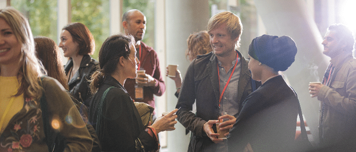 Event Attendees Socializing in Event Space